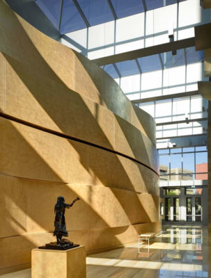 The prefunction space is primarily lit with daylight, reducing the need for articifial lighting in one of the largest spaces in the building.