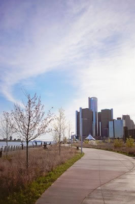 Welcome to the Riverfront Walk Detroit’s riverfront today and the decay feels far away. Fishermen line the rail, and residents walk, ride bikes, and skate past prairie plantings and wetlands. Started in 2003, a project by the Detroit RiverFront Conservancy to turn the riverfront into five miles of uninterruped trails, plazas, pavilions, and green space is now more than halfway completed.