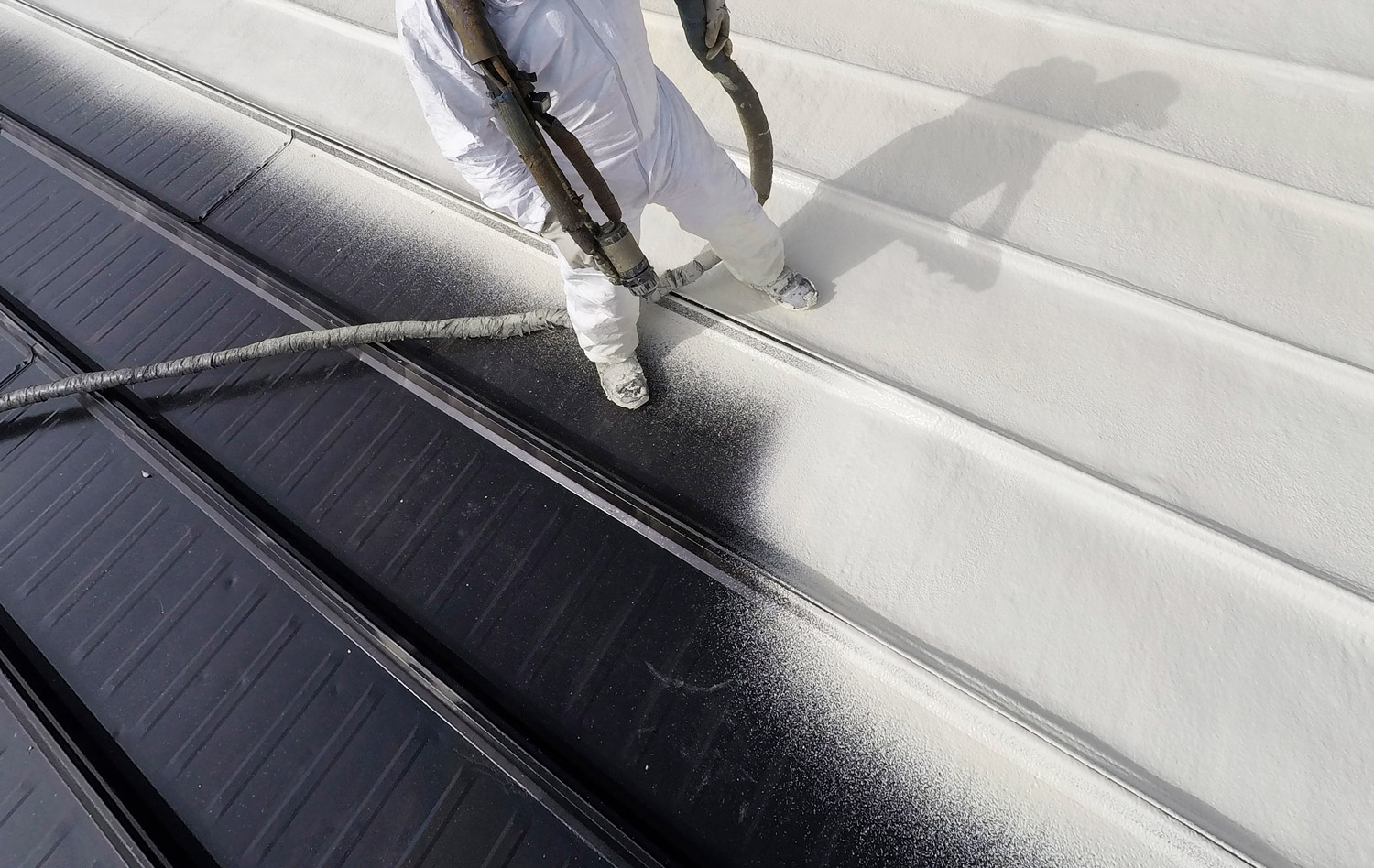 Accella Spraying spray foam roofing systems