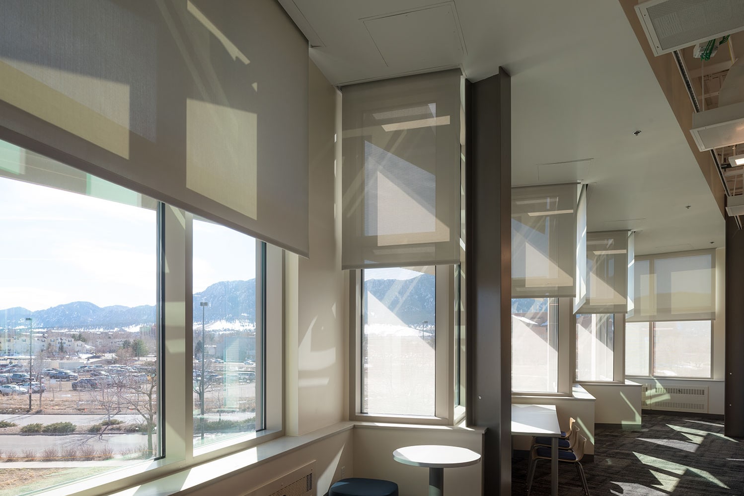 How Motorized Roller Shades Maximize Building Performance