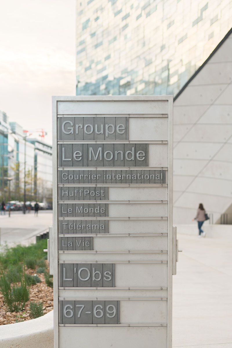 new le monde group headquarters wayfinding sign