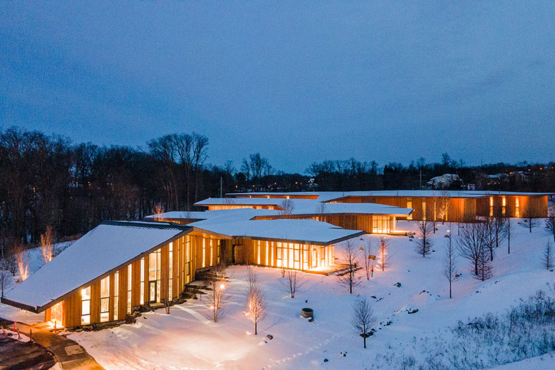 Timber and Glass Combine for the Nature-Inspired JST Production and Engineering Center