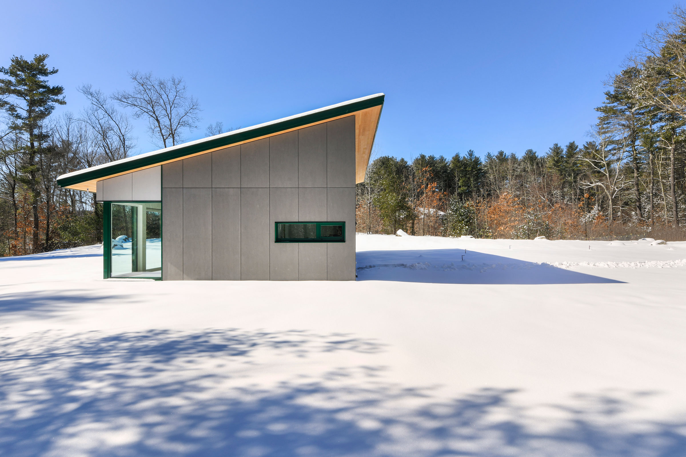 Inside Acton Passive House Retreat in the New England Woods