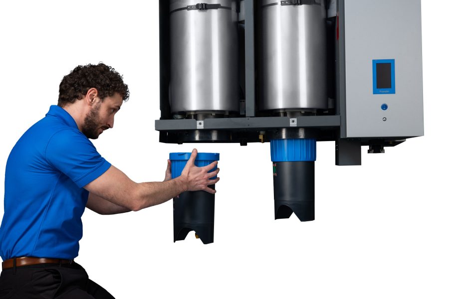 hospitality-comfort-Condair-RS-Person-taking-off-tank-for-maintenance